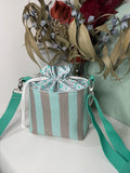 Bolso Bombonera Verde Agua y Gris a Rayas con Flores y Asa Regulable